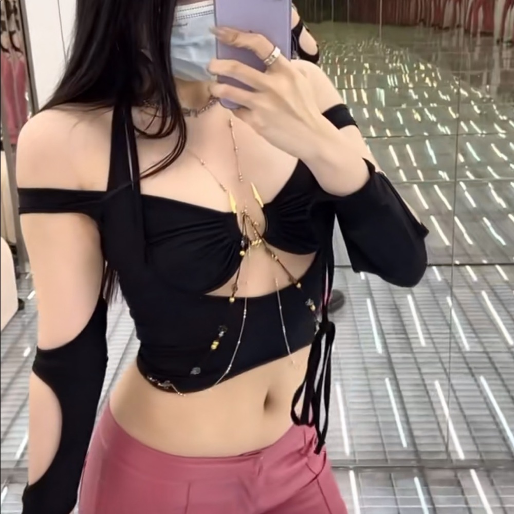 Hyein seo som halter top with sleeves and chains